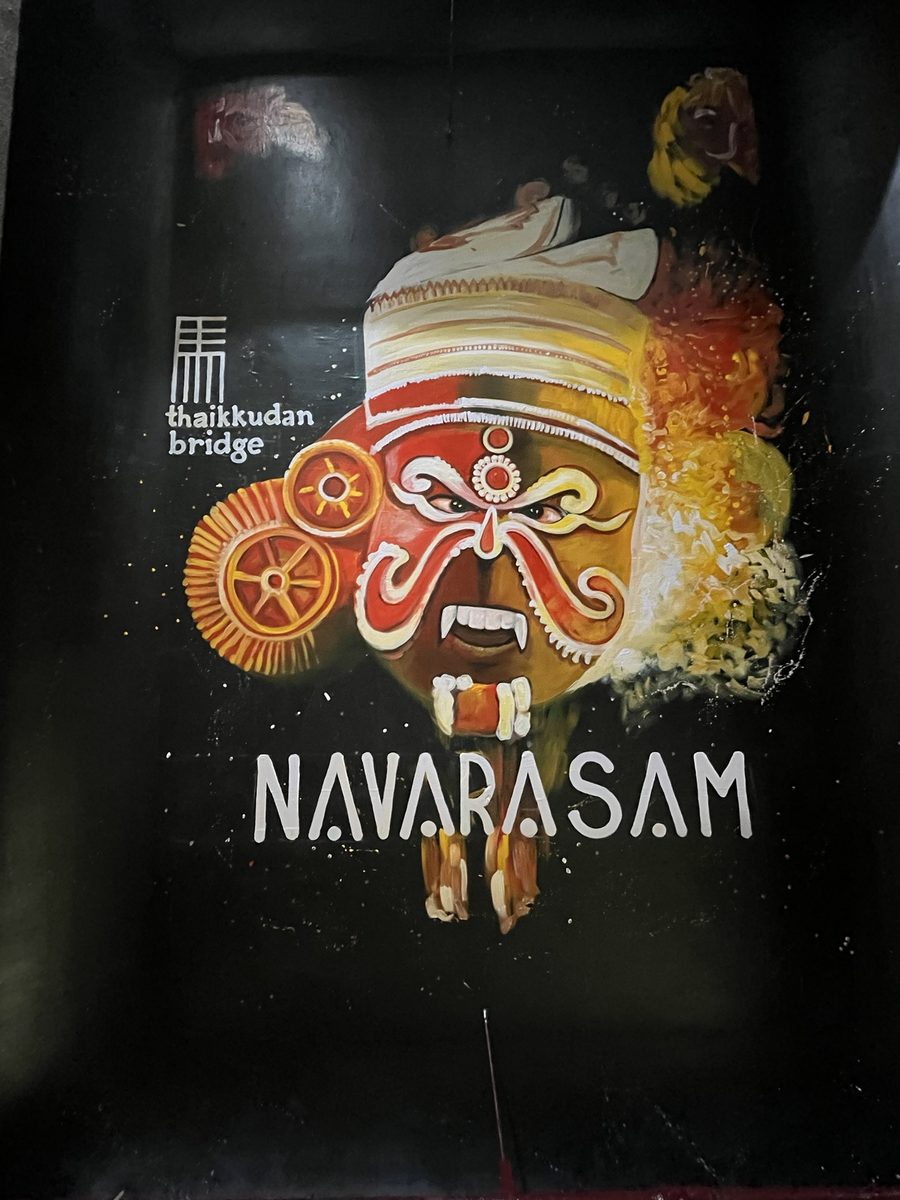 Hand-painted Kathakali ceiling art at Tatsav Cafe